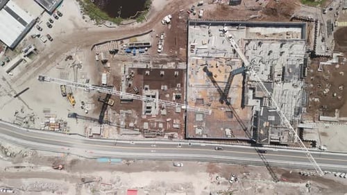 A Construction Development Site in Florida 2 Cranes on the Construction Site Aerial Drone View