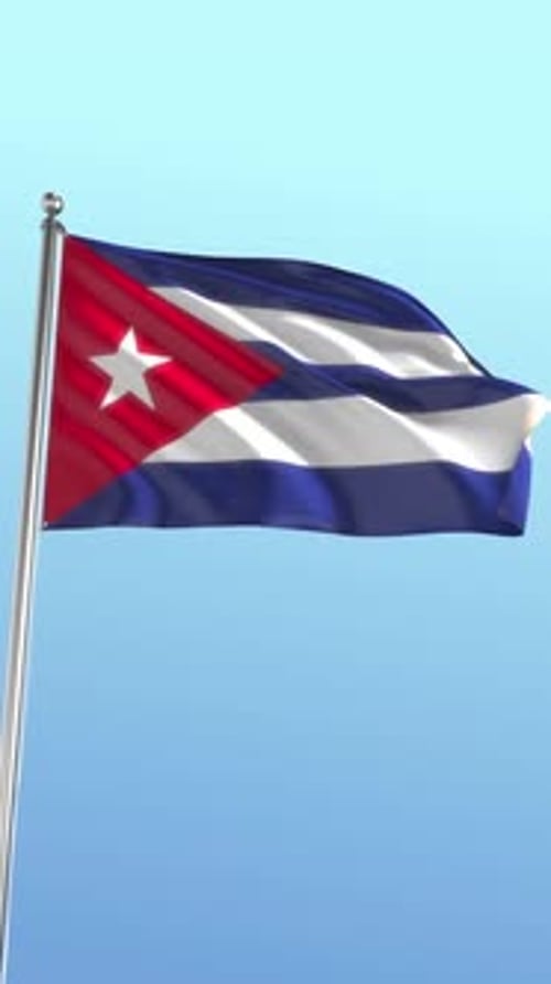 Realistic Waving Flag of Cuba Against a Clear Blue Sky