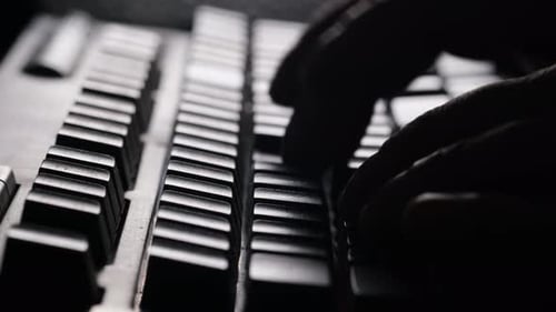 Closeup of Typing Text on Computer Keyboard Hand of Developer Software Programmer