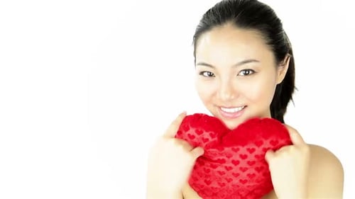 Attractive woman from east asia in her 20s isolated in studio