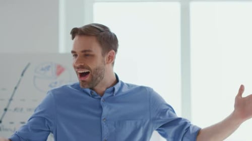 Man Giving Business Presentation in Bright Office