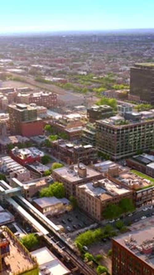Sunlit buildings in the quarters of Chicago. Endless cityscape of metropolis