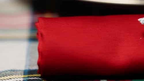 Festive Christmas Table Setting with Red Napkin