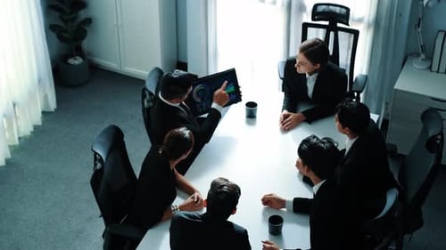 Top view of project manager present financial graph on tablet. Directorate.