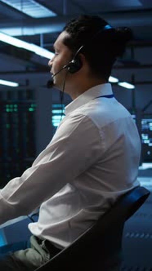 Vertical Video Server Hub IT Professional Talking in Microphone with System Administrators