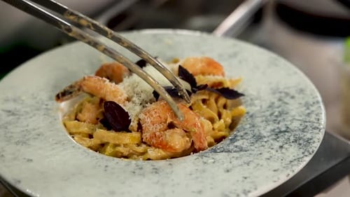 Preparing Delicious Shrimp Fettuccine Pasta Dish