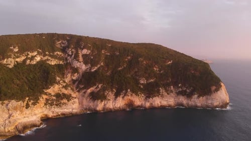 Aerial beautiful beach and water bay in the greek spectacular coast line. Turquoise blue transparent