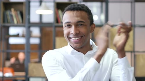 Clapping Black Man Applauding in Office