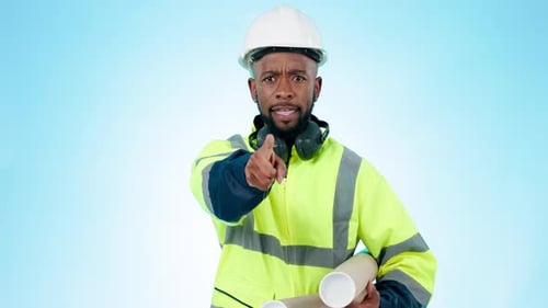 Construction worker, face and man with stop hand pointing in studio for with no