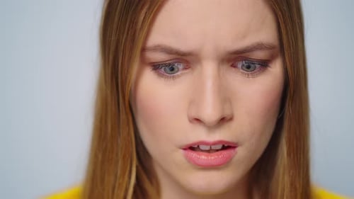 Surprised Woman Looking Upward in Close Up