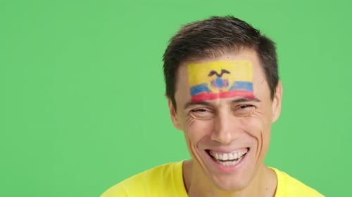 Man Smiling with Flag Painted on Forehead