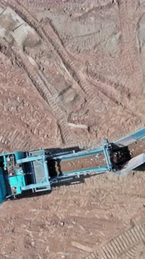 Industrial Machinery Processing Materials from Bird's Eye View