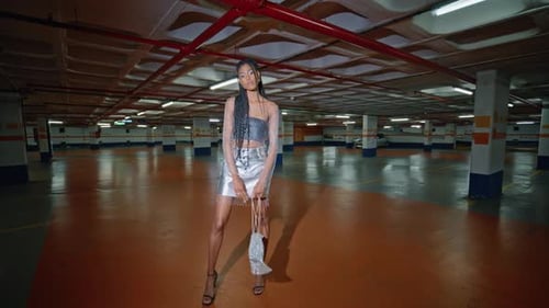Stylish Woman Posing in an Urban Parking Garage
