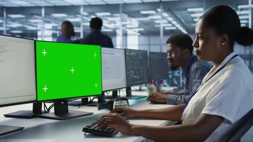 Software Developer in Server Farm Safeguarding Against Hackers with Mockup PC