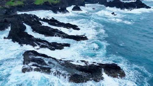 Stormy Foamy Waves Breaking Over Rocks Reefs Ocean Shore of Madeira
