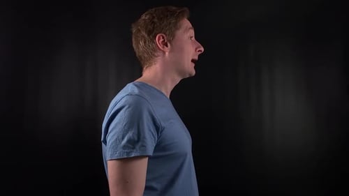 Man Speaking and Giving Thumbs Up Gesture