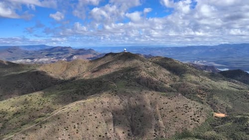 Aerial view of satellite dish on mountain, United States.