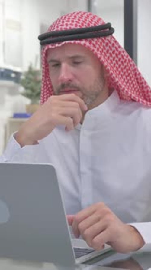 Brainstorming Middle Aged Muslim Man Thinking New Plan, vertical video
