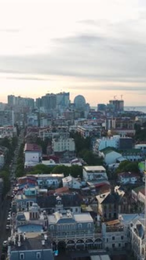 Vertical Video Flying High Over Batumi Georgia Aerial Glimpse of Its Picturesque Architecture and
