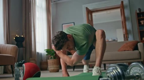 Sporty Guy Stretching Apartment Living Room Man Doing Morning Gym Exercises