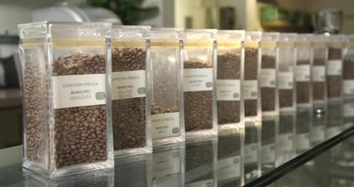 Variety of Colombian coffee beans in coffee shop.