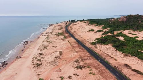 Aerial View of the Beach and the Road.