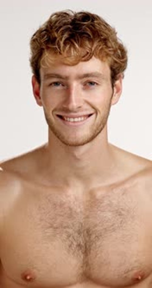 Beauty, face and laughing with shirtless man in studio for masculine health, hygiene or wellness