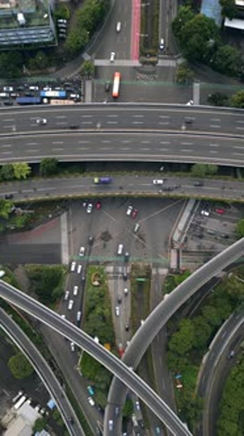 Aerial Topdown View of Highway Interchange with Traffic in Jakarta Indonesia
