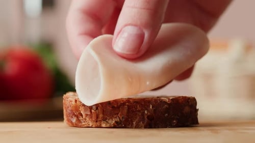 Preparing Turkey on Bread Slice Close Up
