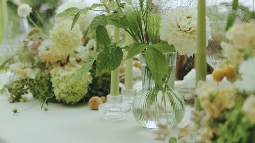 Elegant Table Setting with Flowers and Candles