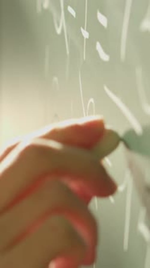 Writing Math Equations on a Chalkboard