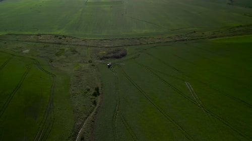 Spray Fertilize On Field With Chemicals In Agriculture Field