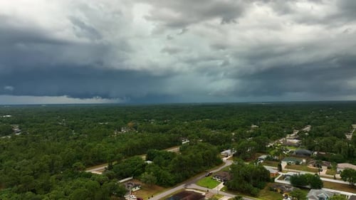 Dark Stormy Clouds Forming on Gloomy Sky Before Heavy Rainfall Over Suburban Town Area