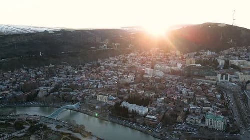 Aerial View of Tbilisi Cityscape in Georgia From Flying Drone at Sunset