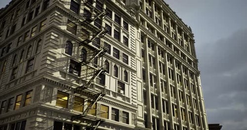 Historic Building with Intricate Architecture Under a Moody Sky in the City