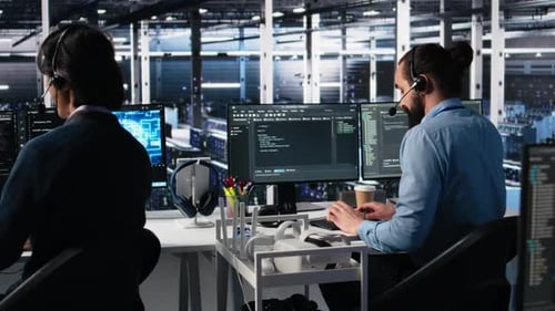 Engineer in Data Center Wearing Headset Assisting Users with AI