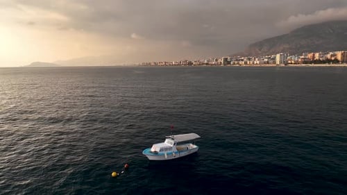 Tranquility on the Horizon Cinematic Drone Films Fisherman's Boat and Underwater Fishing in the