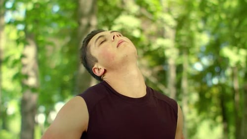 Fitness Man Stretching in Park. Fitness Exercise for Neck. Closeup of Athletic