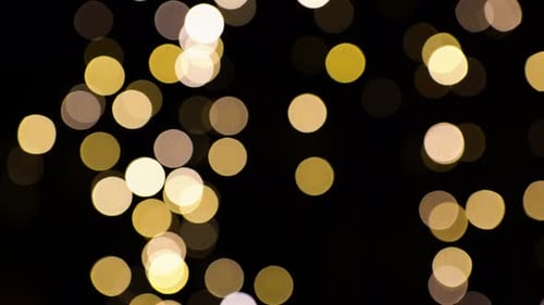Bokeh Background with Golden Lights on Black