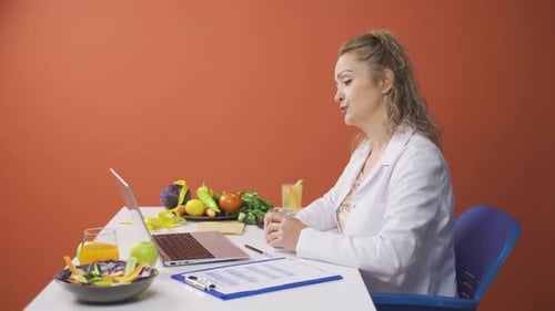 Woman Doctor Consults Online About Diet and Nutrition