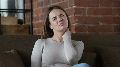 Neck Pain Tired Female Designer with Neckache