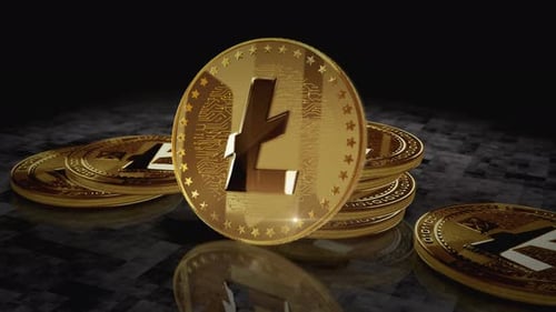 Boucle de pièces dorées de la cryptomonnaie Litecoin LTC sur écran numérique