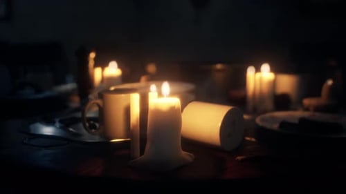 Atmospheric Flickering Candles on Dark Wooden Table