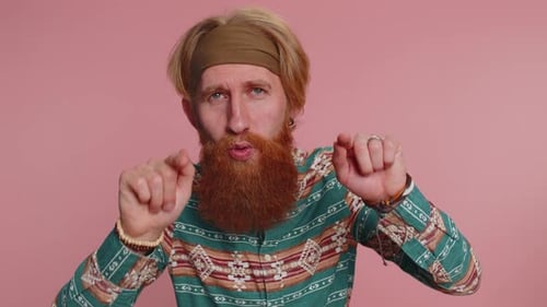 Man Pointing to Camera and Looking with Playful Happy Expression Making Choice of Lucky Winner