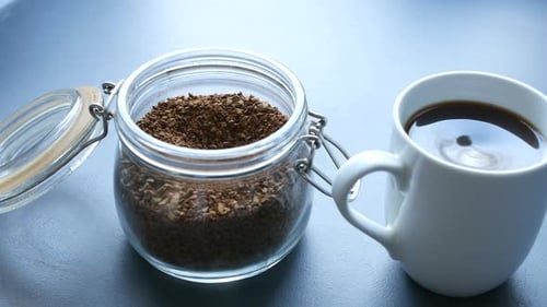 Coffee Jar and Mug of Fresh Brewed Coffee