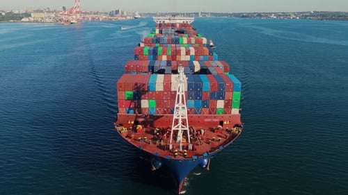 Massive Ocean Cargo Ship Escorted By Tugboats From Halifax Nova Scotia