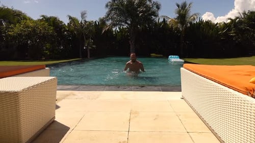 Young Man Swimming in Pool and Walking Out, Super 120