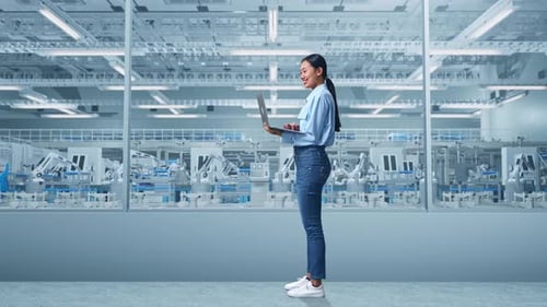Asia Professional Female Work On Laptop at Factory Digitalization