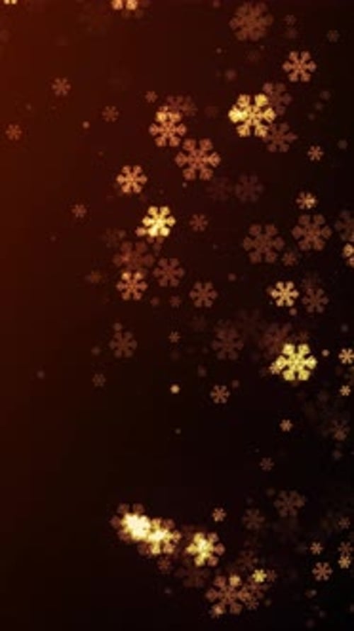 Golden glitter trail with glowing snowflakes.