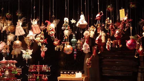 ornaments hanging in a shop stall in Streasbourg at a Festive Christmas market in Europe
